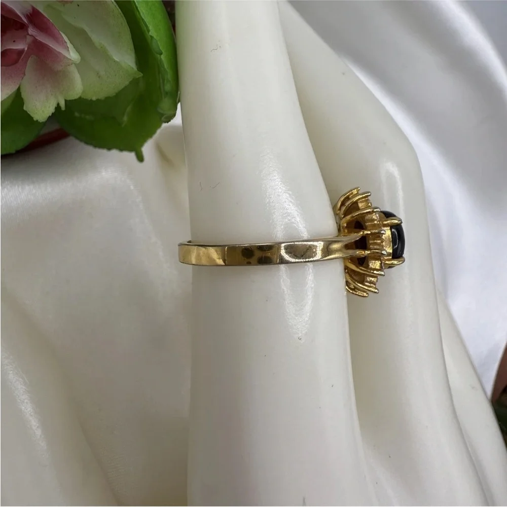 18K Gold Ring with Black Center Stone and Clear Accent Stones